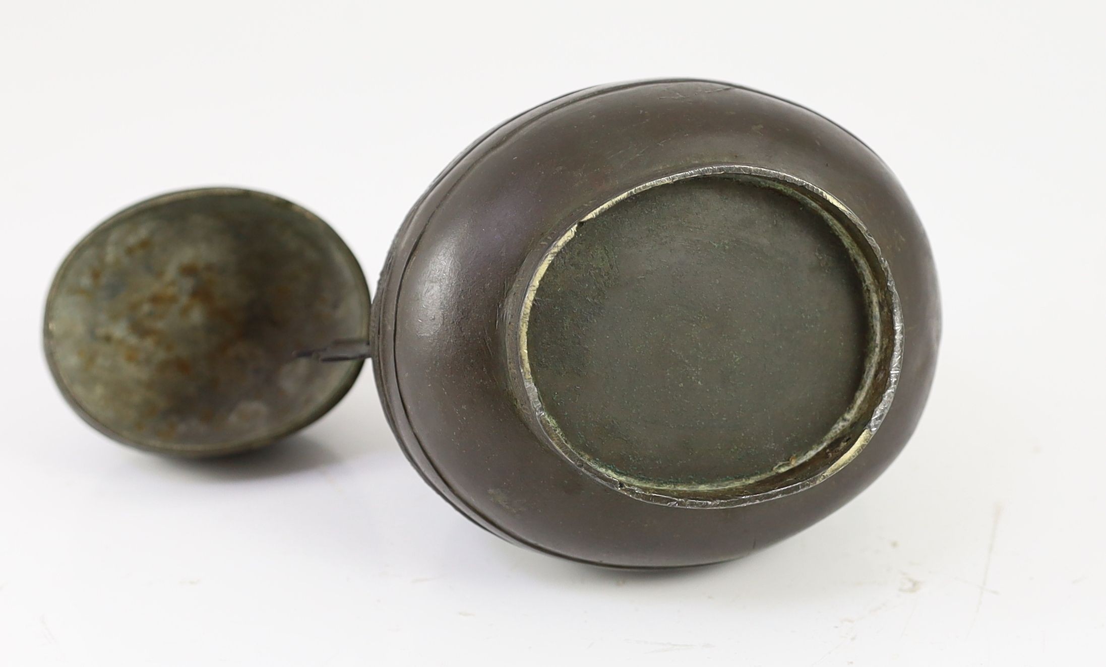A Chinese bronze jar and cover, hu, 17th/18th century, 18cm high, losses to handles